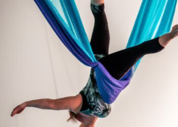 Aerial Fitness: Soaring to New Heights with Aerial Silks and Hoops